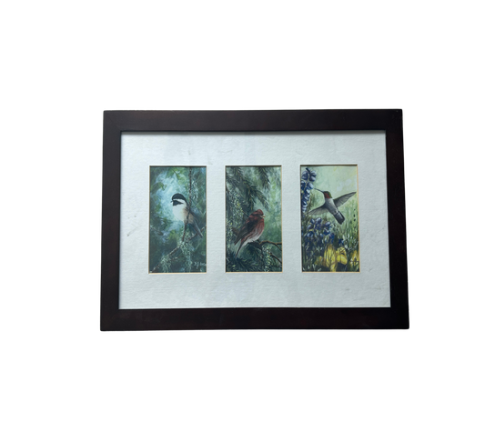 This captivating painting, framed elegantly, depicts a graceful bird in its natural setting, a testament to the artist's meticulous brushwork and nature's beauty. A mesmerizing piece for art and nature lovers alike, it highlights the delicate balance of the avian world, available at the hearing clinic at Allard Audiology.