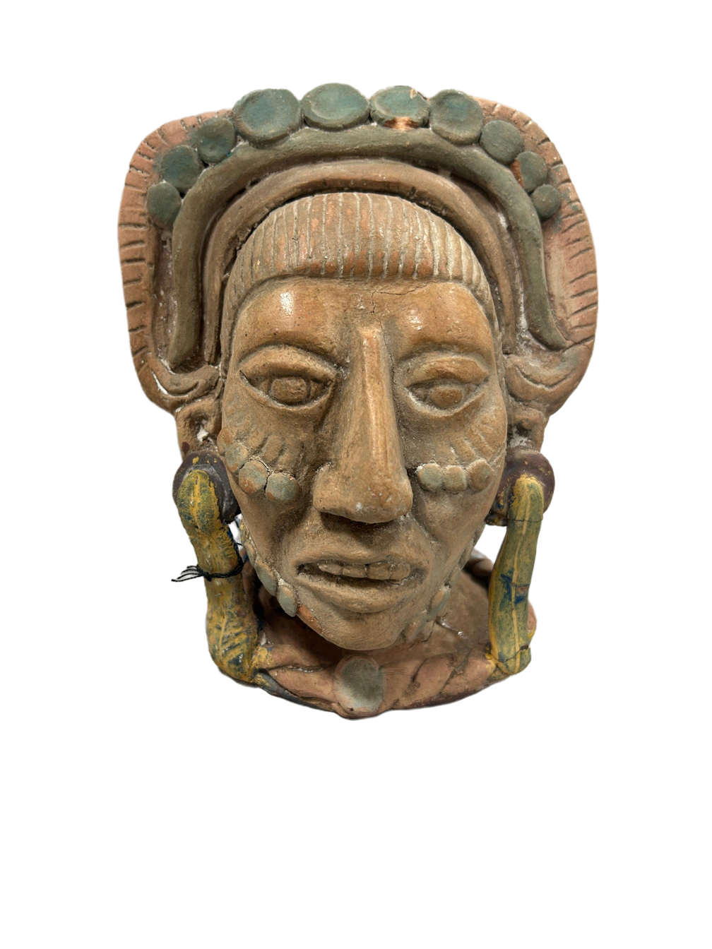 mask sculpted in the likeness of a carved, showcasing a bronze patina finish, reflecting the artist's skill in capturing human head and expression.Available at the hearing clinic at Allard Audiology.