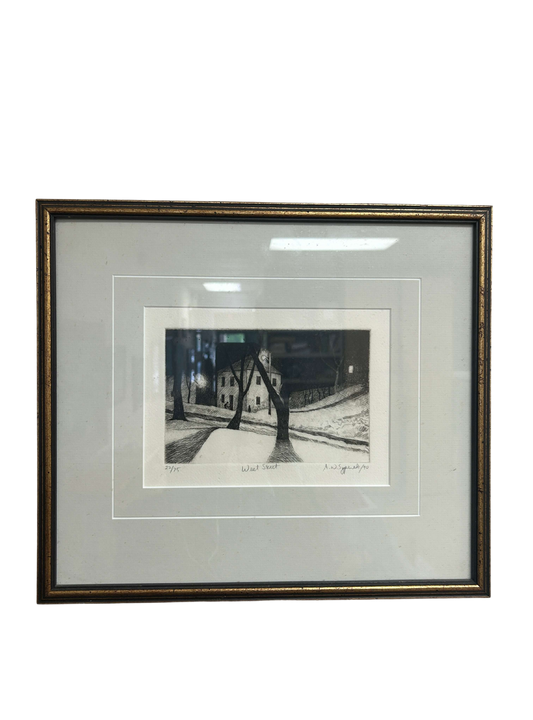 This captivating illustration, encased in an elegant wooden frame, masterfully blends shades of black and white, creating a mesmerizing monochrome effect that captures the viewer's imagination with its intricate depiction of a resilient twig, symbolizing the beauty of simplicity and nature's unwavering resilience; available at the hearing clinic at Allard Audiology.